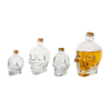 Botellas de vidrio de cráneo de forma única y tazas de vidrio proveedores